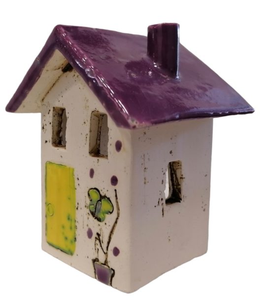 Clay Candlestick House with Purple Roof.