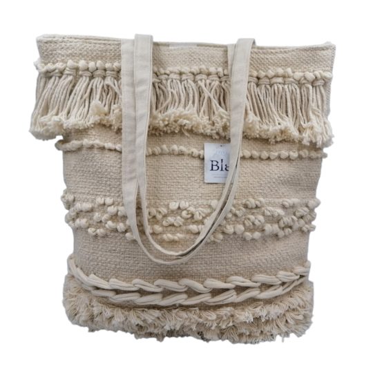 Fabric Bag with Embroidered Designs & Fringe in White Color.